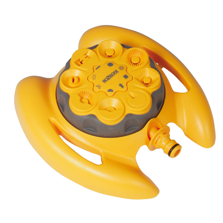 Aspersor Hozelock Vortex amarillo con selector de 8 patrones de riego y conexión rápida sobre base de trineo