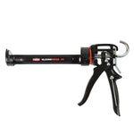 Pistola de silicona profesional RATIO Press-24 negra con relación de empuje 24:1 y mango ergonómico de aluminio.