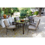 Comedor de jardín completo con mesa y seis sillones Madeira en ambiente exterior