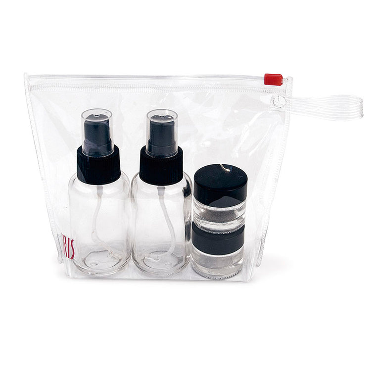 Neceser transparente con el set de 4 recipientes de vidrio IRIS para aliños en su interior.