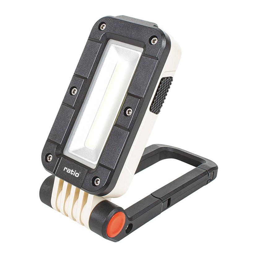 Linterna de trabajo RATIO RB380 plegable con luz LED COB frontal y soporte articulado negro.