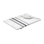 Almohadilla eléctrica Beurer HK 25 blanca con rayas grises y mando de control de temperatura.