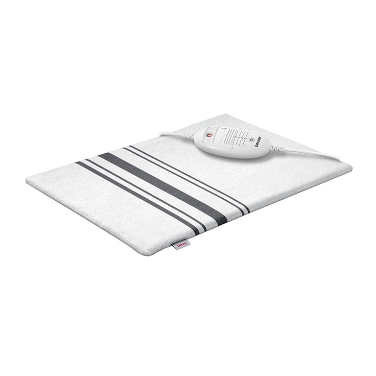 Almohadilla eléctrica Beurer HK 25 blanca con rayas grises y mando de control de temperatura.