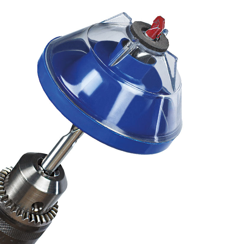 Detalle de broca atravesando el sello de espuma del recogedor de polvo RATIO.