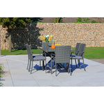 Conjunto de comedor exterior Aruba con mesa de cristal y sillones de ratán gris en terraza