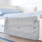 Detalle de la barrera de cama Arregui en posición abatida para hacer la cama cómodamente.