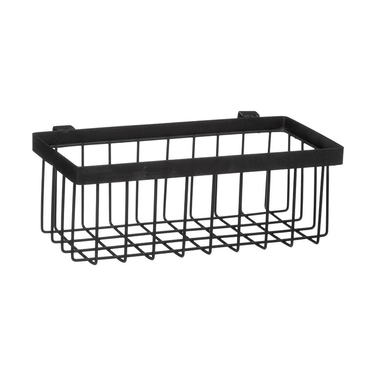 Detalle de cesta metálica negra de rejilla para accesorios de limpieza de cocina