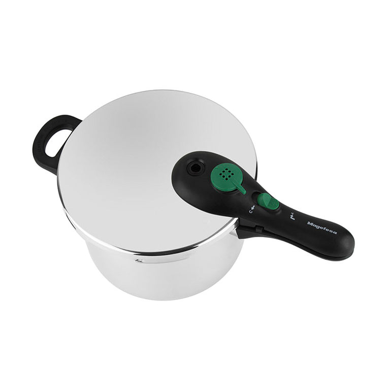Vista superior de la tapa Magefesa Dynamic con válvula de seguridad y selector de presión verde