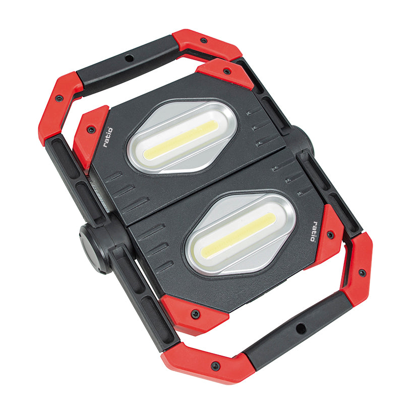 Lámpara de trabajo RATIO XF-01 abierta mostrando sus dos focos LED de 10W y asas ergonómicas.
