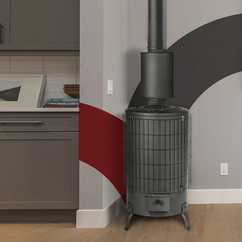 Estufa de leña THECA instalada en un salón moderno mostrando su diseño compacto y funcional.