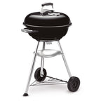 Barbacoa de carbón Weber Compact Kettle 47cm negra con tapa cerrada y ruedas de transporte.