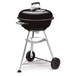 Barbacoa de carbón Weber Compact Kettle 47cm negra con tapa cerrada y ruedas de transporte.