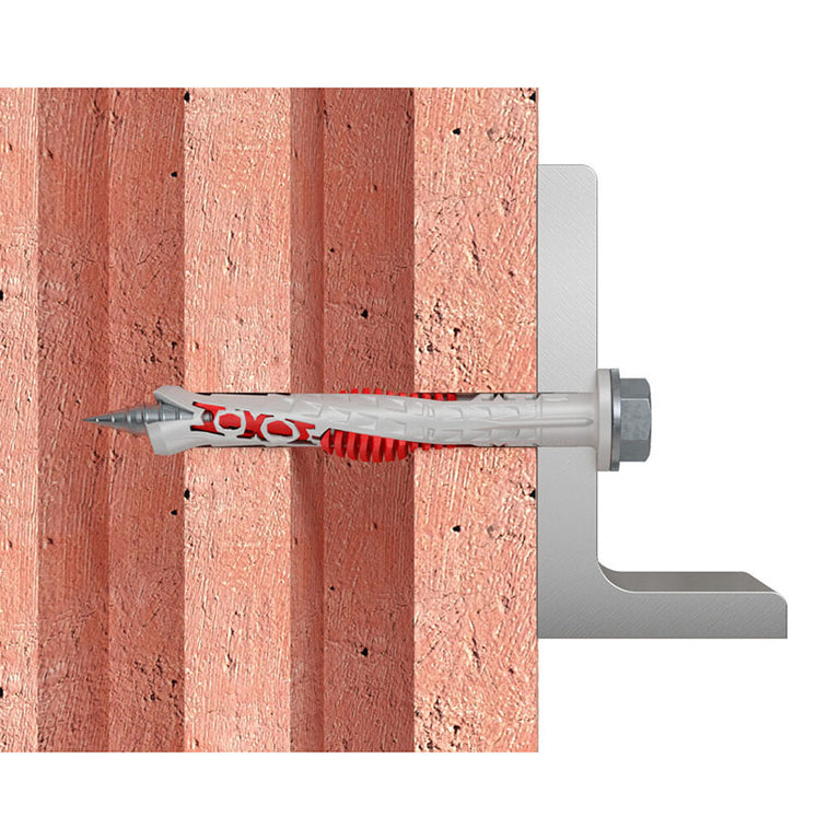 Demostración de anclaje Fischer DuoXpand en ladrillo hueco con expansión adaptativa de seguridad.
