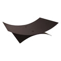 Leñero ovalado de hierro negro El Zorro con diseño curvo moderno para almacenamiento de leña