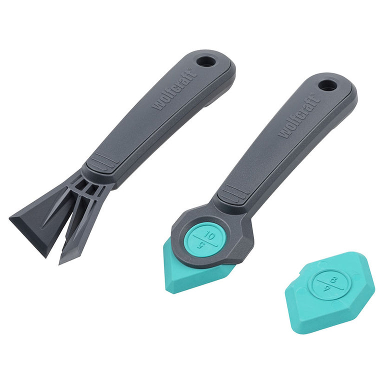 Kit Wolfcraft de 4 piezas para renovación de juntas con rascador gris y perfiladores color turquesa.