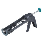 Pistola de silicona Wolfcraft MG 100 gris con gatillo ergonómico y varilla de empuje.