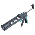 Pistola de cartuchos Wolfcraft MG 550 en color gris y turquesa con manguito giratorio.