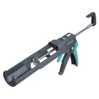 Pistola de cartuchos Wolfcraft MG 550 en color gris y turquesa con manguito giratorio.