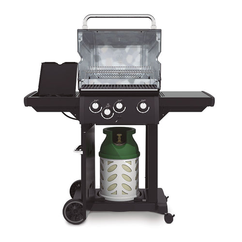 Interior de barbacoa Broil King Royal 340 Shadow mostrando parrillas de hierro y quemador lateral abierto