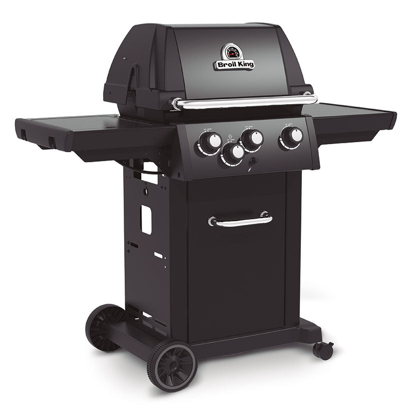 Vista frontal de la barbacoa Broil King Royal 340 Shadow con armario inferior y ruedas de transporte