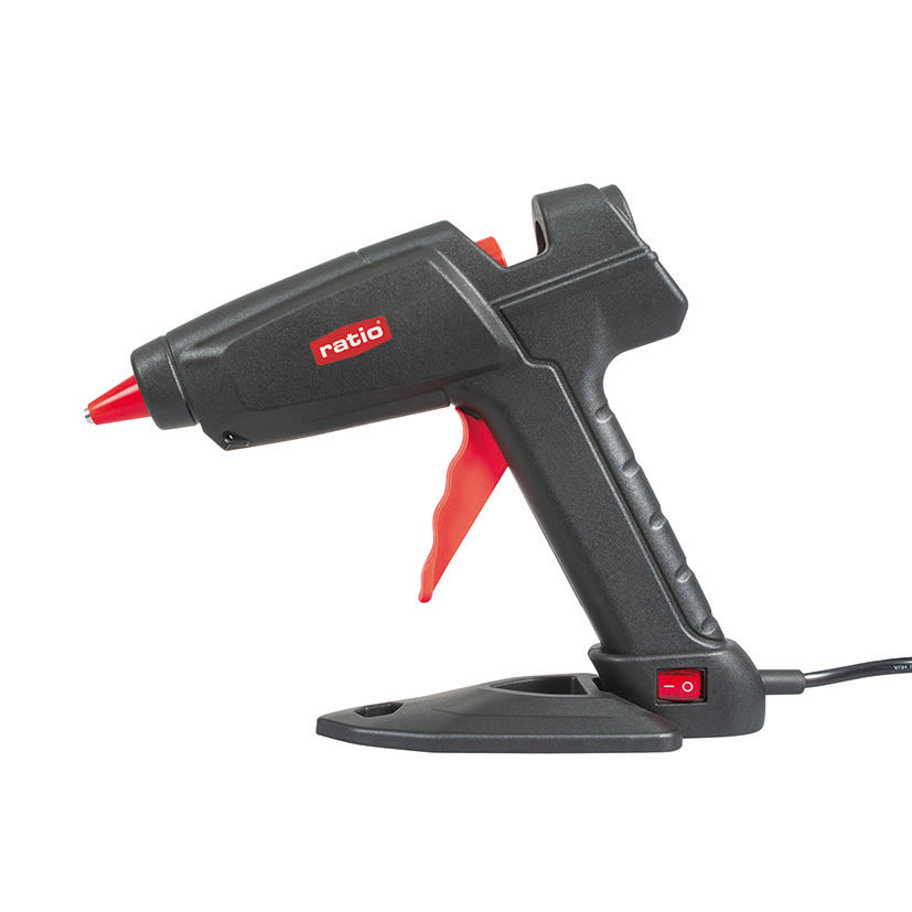 Vista lateral de la pistola de silicona caliente RATIO R-P100 mostrando el gatillo ergonómico y el interruptor.