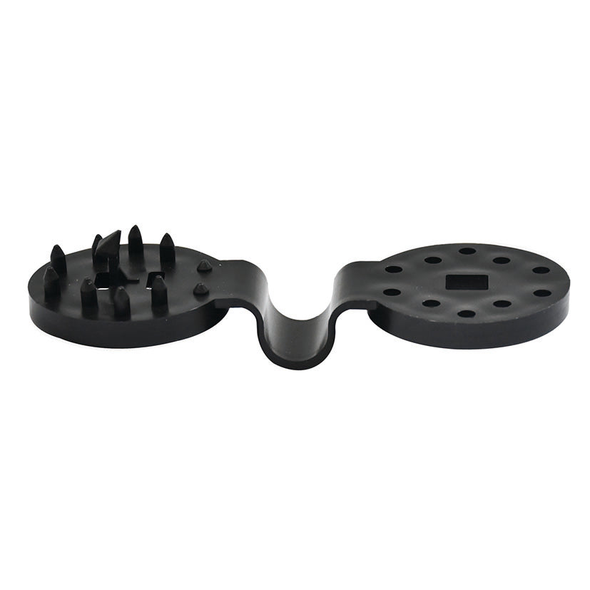 Pinza de polipropileno para mallas abierta mostrando dientes de anclaje