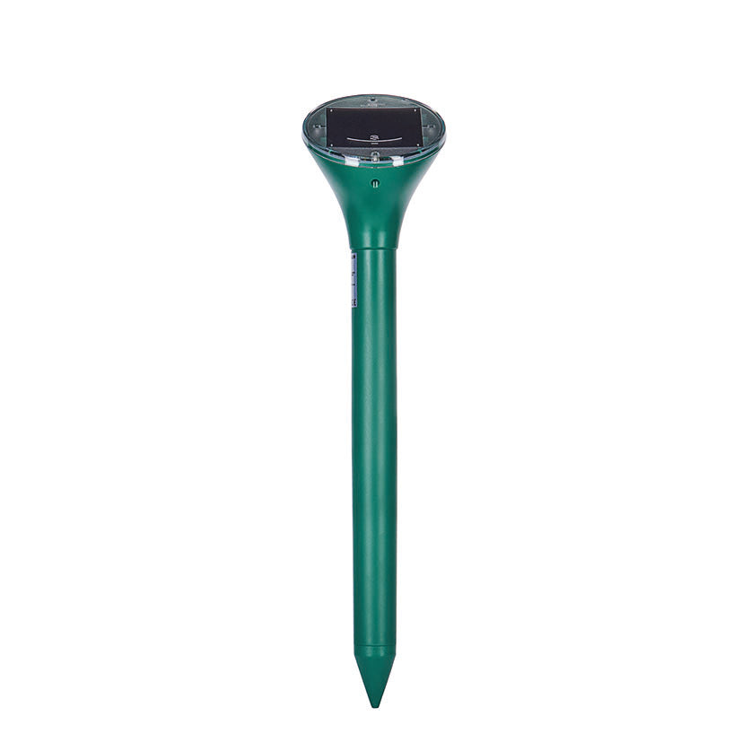 Ahuyentador solar de topos Swissinno verde con estaca para enterrar en jardín.