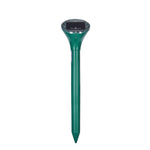 Ahuyentador solar de topos Swissinno verde con estaca para enterrar en jardín.