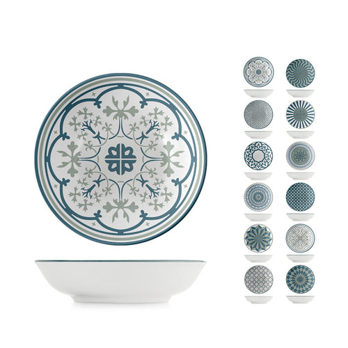 Colección de boles y platos Nora con diversos estampados geométricos en azul y gris