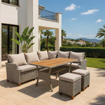 Set de muebles de exterior Canaima instalado en una terraza moderna con vistas al jardín y montaña.