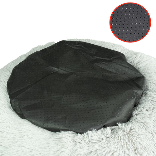 Detalle de la base negra antideslizante con textura de puntos de la cama para mascotas