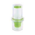 Aceitera con pincel de silicona Iris 60ml con tapa protectora transparente y detalles en color verde.