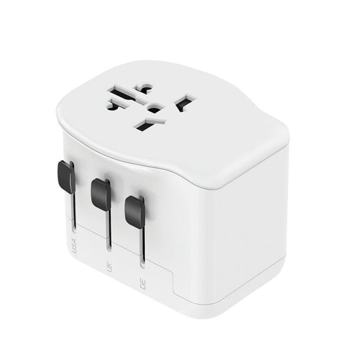 Vista superior de adaptador de corriente con tomas universales para múltiples países.