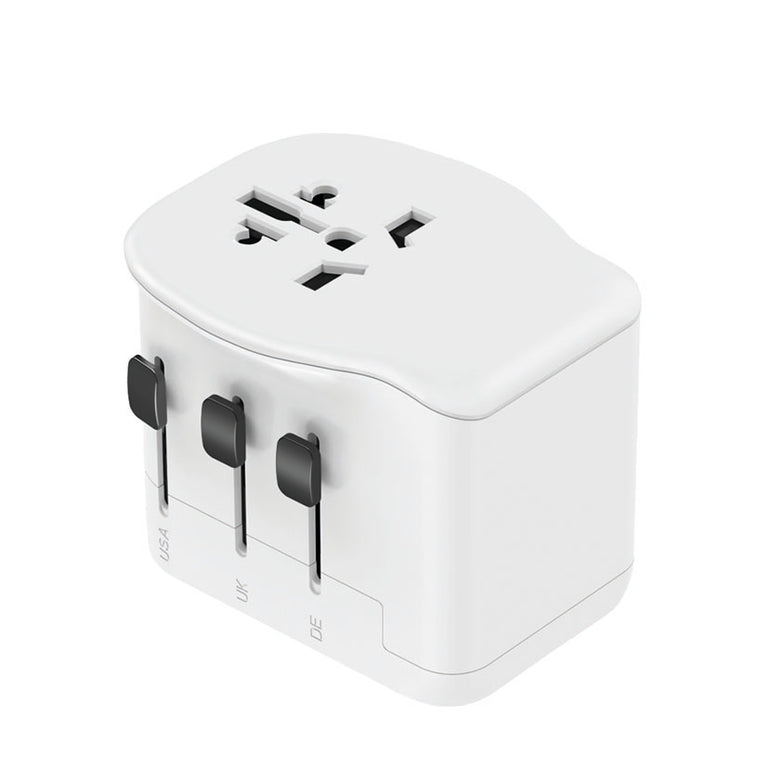 Vista superior de adaptador de corriente con tomas universales para múltiples países.