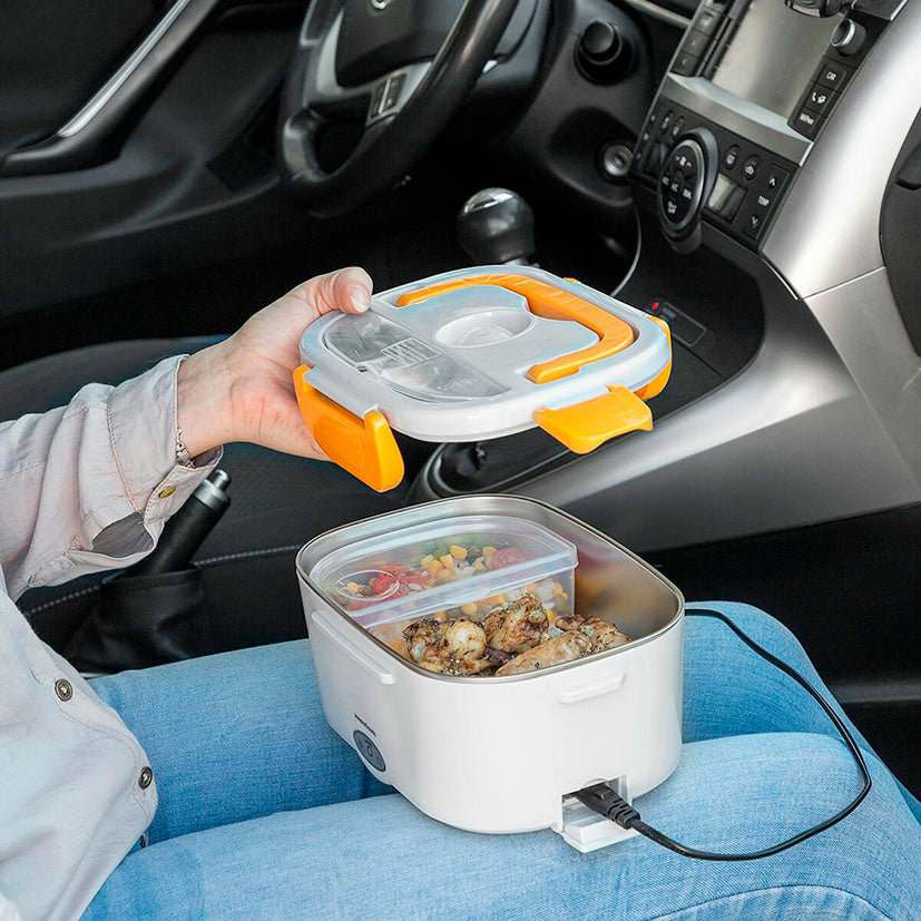 Fiambrera eléctrica Lunffi usada en el coche conectada a la toma de 12V con comida caliente