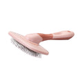 Cepillo para perros Fackelmann Our Pets color rosa con mango ergonómico y cerdas metálicas con puntas protectoras