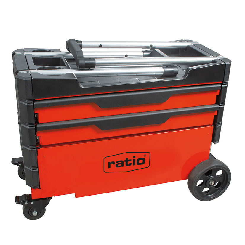 Carro portaherramientas RATIO 7705 plegado, listo para ser transportado en vehículo, mostrando ruedas y estructura rígida de chapa.
